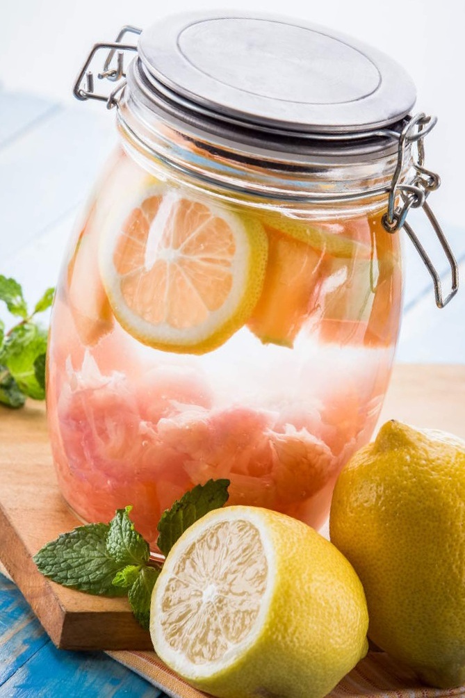 How to clean with vinegar - jar of lemons
